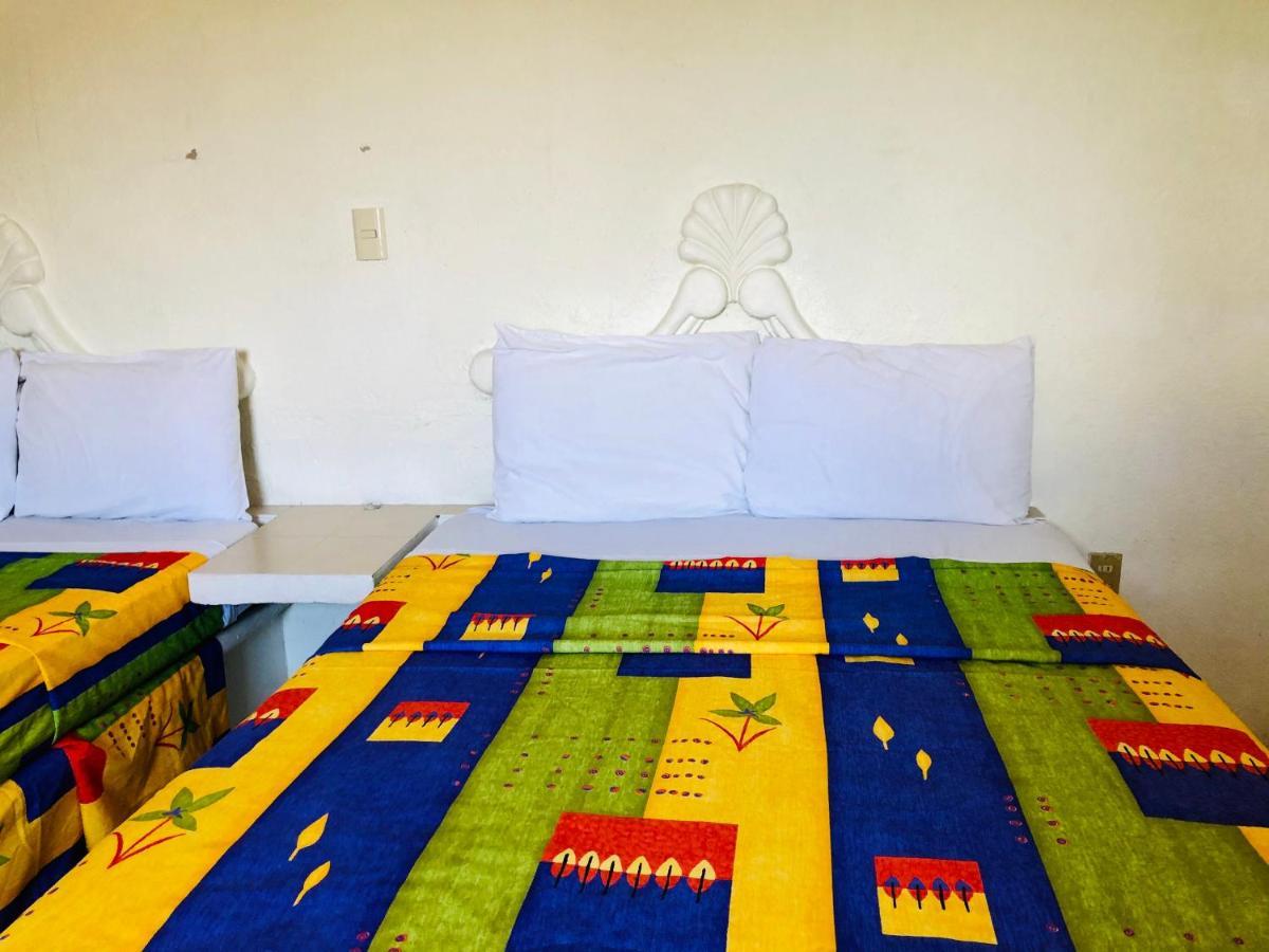 Hotel Playa Del Parque By Rotamundos Huatulco Экстерьер фото